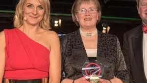 Alexis Lay of LEK Lubrication, centre, collects her award from MMIA17 host Louise Minchin and Paul Marwick of award sponsor the Manufacturing Technology Centre (Photo: LEK Lubrication Systems)