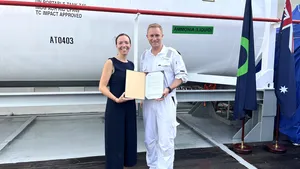 Cristina Saenz de Santa Maria, DNV’s Regional Manager South East Asia, Pacific & India, Maritime, handed over class and statutory certificates to Dino Otranto, Fortescue Metals CEO, for the dual-fueled ammonia-powered vessel Green Pioneer (Photo: DNV)