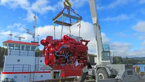 One of the two new Cummins QSK38 engines being swung in (Photo: Mike Fourtner / Cummins)