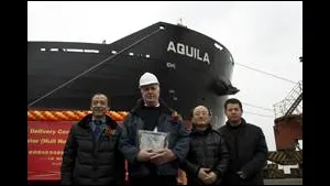 Delivery of M.V. Aquila: Left to right: Mr. Zhuang Tian, LR Surveyor in Charge Nantong; Master - M/V Aquila; Mr. Tae-Bok Kwak, LR Project Manager; Mr. Xiaofeng Yang, LR Site Office Team Leader.