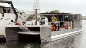 Gold Dredger: Photo credit Art Anderson Associates