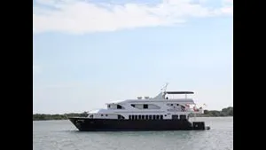 Dive Boat fitted with hp Caterpillar C-18 diesel engines rated at 1800 rpm coupled to twin UltraJet 575 waterjets. 