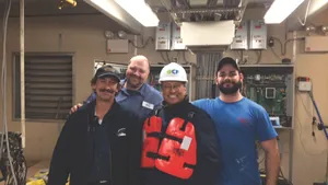 Ed Grimm, (second from left) CEO, Southern Towing Company during a crew visit.