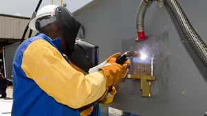 Lee Jackson Inscribes Keel Plate: Photo credit BAE