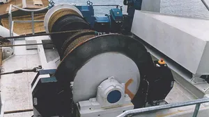 A luffing and trolley travel hoist for bagged material used by two vessel loaders at Lake Charles, Louisiana. The hoists are fitted with Dellner SKP service brakes with mounting stands installed between the hoist motors and the reduction gears. The brakes were also manufactured with extra protection to prevent corrosion from sea water.