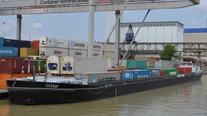 The OliMar at the Basel container port. (Photo courtesy of Cummins Marine)