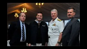 From Left: John O’Malley, owner and publisher, Marine Technology Reporter; Rob Howard, VP Sales & Marketing; U.S. Navy CNO Admiral Gary Roughead; and Greg Trauthwein, Associate Publisher and Editor. The CNO was conferred “Seamaster 2011” at the OceanTech Expo in Newport, RI. (Photo: U.S. Navy)