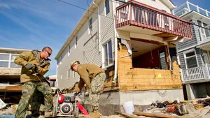 Pumping Out Residential Premises: Photo credit USN