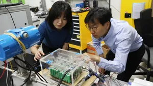 Research team at KIMM’s Heat Pump Research Center (Dr. Jinsub Kim pictured on the left)Dr. Jinsub Kim at KIMM operates the spray-based immersion cooling chamber.  Image Copyright KIMM