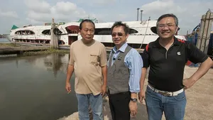 left to right: Sakchai Rujiphapra, Director, Mahachai Dockyard; Sathit Suwanprasert, Senior Engineer, Marketing Dept., Cummins DKSH (Thailand) and Ku Wee Ming, Manager, Regional Marketing, Cummins Asia Pacific with the newly launched Wonderful Pearl currently being fitted out alongside at the shipyard. (Haig-Brown photo courtesy of Cummins Marine)