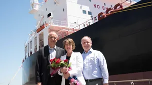 From left to right: Don Templin, Carrie Templin and Tom Crowley, in front of the LNG-ready Jones Act product tanker Louisiana (Photo: Crowley)
