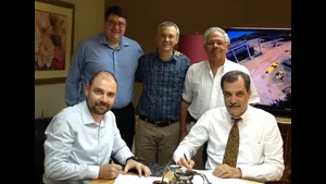 Signing ceremony between Wärtsilä and Shipyard SA. Sitting from right to left: Guillermo Ehreke, GM and owner of Naviera Yeruti and Shipyard SA; Piotr Kabacinski, GM Sales, Americas, Wärtsilä Ship Power. Standing from right to left: Eduardo Masciottra, Warag SRL, Wärtsilä agent, Buenos Aires; Jorge de la Guardia, GM and owner of Naviera Yeruti and Shipyard SA; Joe Amyot, Area Sales Director, Wärtsilä Ship Power.