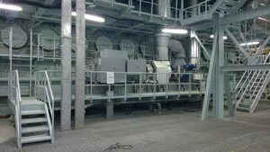 A TCS-PTG22 unit pictured adjacent to the MAN B&W 12K80MC-S engine at the Miraflores power Plant in Panama