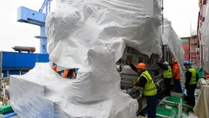 Aft Gas Turbine Installation on the Prince of Wales QEC Aircraft Carrier. Rolls Royce Turbiine is installed, followed by the Alternator. (Photo: John Linton)