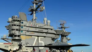 Unmanned Aircraft Taxies on US Aircraft Carrier