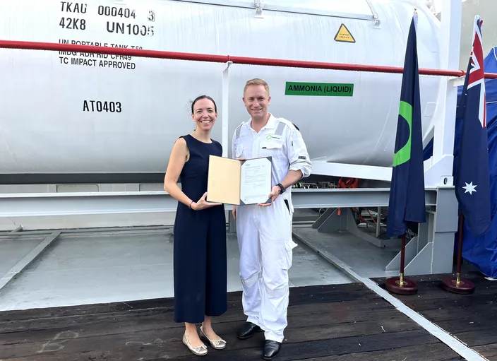 Cristina Saenz de Santa Maria, DNV’s Regional Manager South East Asia, Pacific & India, Maritime, handed over class and statutory certificates to Dino Otranto, Fortescue Metals CEO, for the dual-fueled ammonia-powered vessel Green Pioneer (Photo: DNV)
