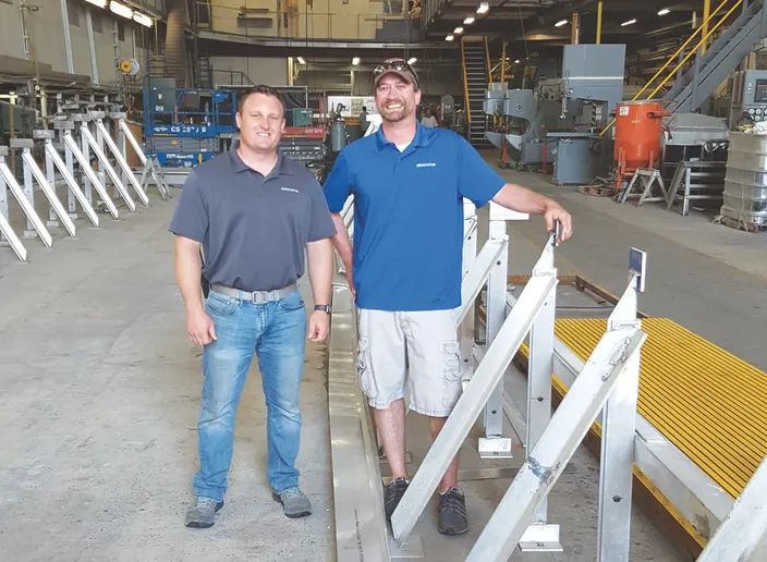 Derecktor Shipyard General Manager Micah Tucker and Project Manager Joe Goodspeed shaping the Keel for the first Harbor Harvest Hybrid.