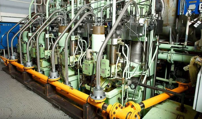 Back in 2004, MAN Diesel & Turbo started the first test program with EGR on the large 4T50ME-X two-stroke diesel test engine in Copenhagen, in order to verify the effect of EGR. Image shows the cylinder-head platform of the test engine