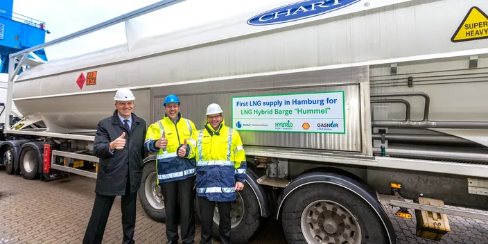 The first container with LNG in Hamburg. Aksel Skjervheim, Shell Gasnor; Dirk Lehmann, Becker Marine Systems; and Max Kommorowski, Becker Marine Systems (Photo: Becker Marine Systems)