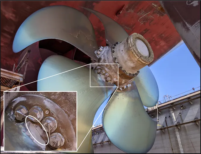 The five-bladed controllable pitch propeller on the Maunalei showing a fracture (inset) at the base of the no. 4 blade. (Source: U.S. Coast Guard)