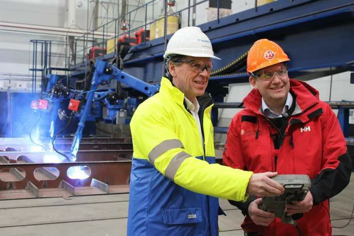 Hurtigruten CEO Daniel Skjeldam (right) officially started the construction of MS Roald Amundsen at Kleven Yards, Norway. Kleven CEO Ståle Rasmussen (left). (Photo: Hurtigruten)