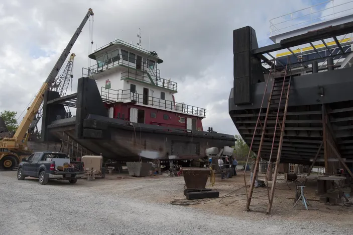 The latest Leboeuf towboat sits between two sisters at the Intracoastal Ironworks yard (photo: Alan Haig-Brown)