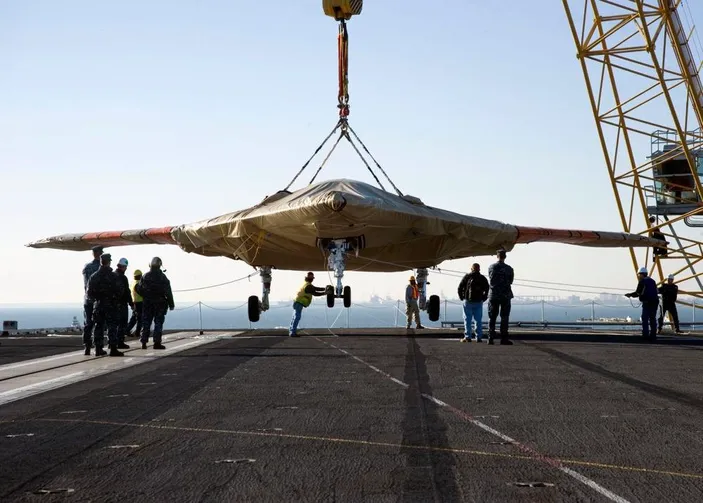 Loading Drone Aboard: Photo credit USN