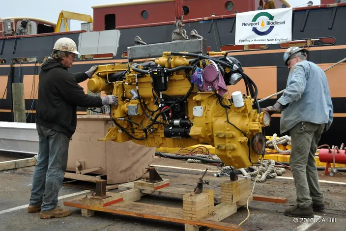 This week, the SSV Oliver Hazard Perry installed two Caterpillar C-12 main engines from Milton Cat, one of the Perry’s Marine Trades Partners. Each is certified to run on a 20% biofuel-to-diesel blend that will be provided by another of the ship’s Marine Trades Partners, Newport BioDiesel. (Photo Credit: OHPRI/Carol Hill)