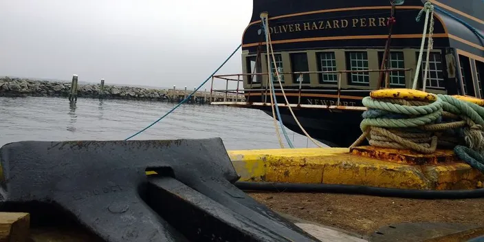 The SSV Oliver Hazard Perry’s 1,200-pound anchor sits dockside at Senesco Marine while the ship’s Great Cabin undergoes interior and exterior work. (Photo Credit: OHPRI/Barby MacGowan)