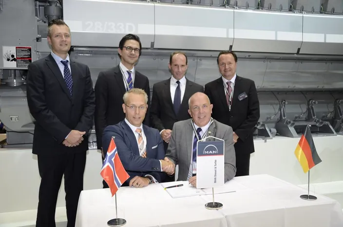 Pictured at the signing ceremony: (standing, from left) Mikael Adler – Managing Director, MAN Diesel & Turbo, Norway; Serghei Nastas – MAN PrimeServ O&M Sales Manager; Dr. Stephan Timmermann – Member of Executive Board, MAN Diesel & Turbo; Stefan Eefting – Vice President, Head of MAN PrimeServ; (seated, from left) Lars-Heine Njåstad – Chief Procurement Officer, DOF; and Wayne Jones – Senior Vice President, Head of MAN PrimeServ Diesel