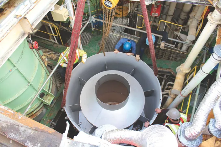 Rigging the scrubber section into the ship. (Photo: Goltens)