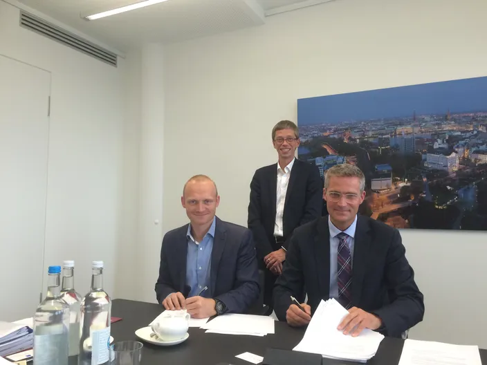 Seated from left to right: Jens Groth, CEO Chris-Marine/IOP Marine and Oliver Dankert, Attorney at Law; Standing: Björn-Thorben Porep, Area Sales Manager Chris-Marine Germany  (Photo: Chris-Marine AB)