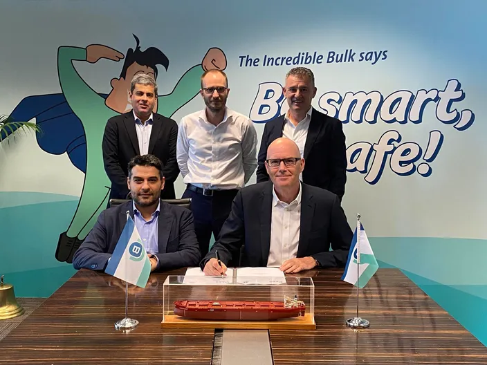 (Seated left to right) Panos Koutsourakis, ABS Vice President of Global Sustainability; and James Marshall, Berge Bulk CEO. (Standing left to right) Arnab Ghosh, ABS Director, Business Development; Sylvain Julien, Berge Bulk Head of Innovation and Newbuilding; Paolo Tonon, Berge Bulk Technical Director. Image courtesy ABS