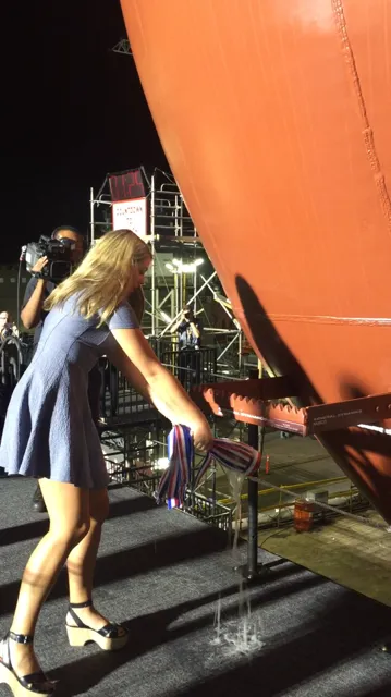 The ship’s sponsor Emma Engle christens the vessel (Photo: General Dynamics NASSCO)