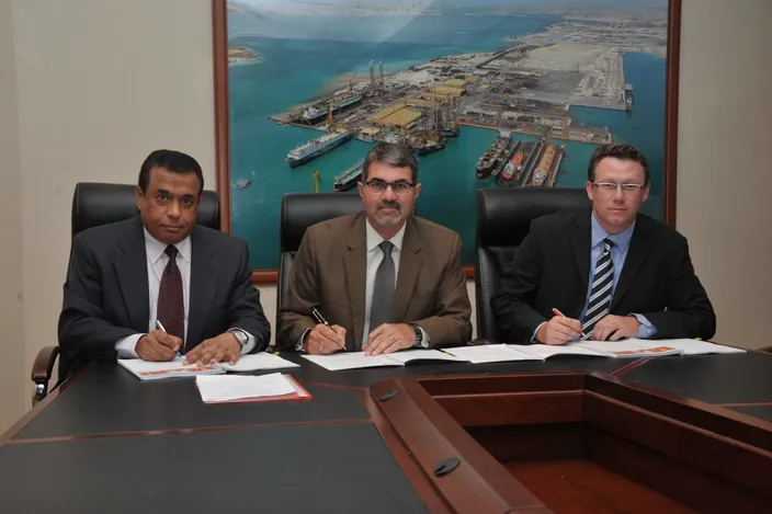 ASRY signs ABB pact: (L to R) Magdy Mustafa, Nils Kristian Berge, John Fyfe