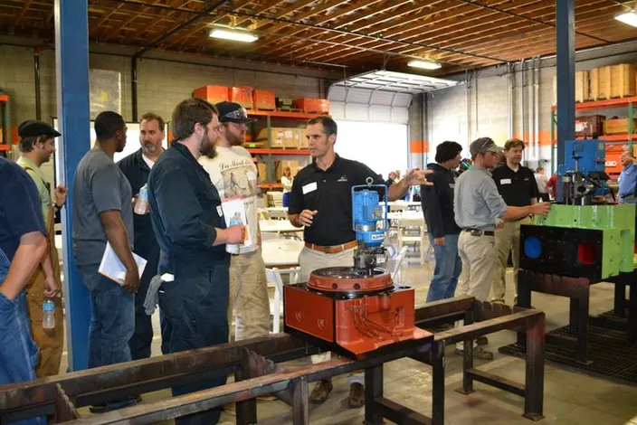 Wärtsilä Contract Management General Manager, Sean Carey provides a tour of cylinder head reconditioning processes available at the new Seattle workshop.
